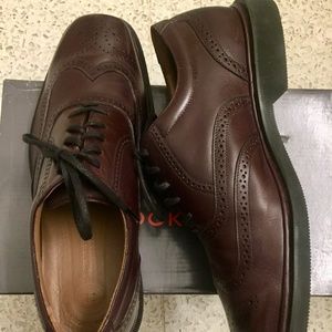 Men's never worn Cordovan color Wing-tip Oxford lace up shoes.